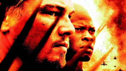 HD wallpaper featuring intense close-ups of Leonardo DiCaprio and Djimon Hounsou from the movie Blood Diamond.