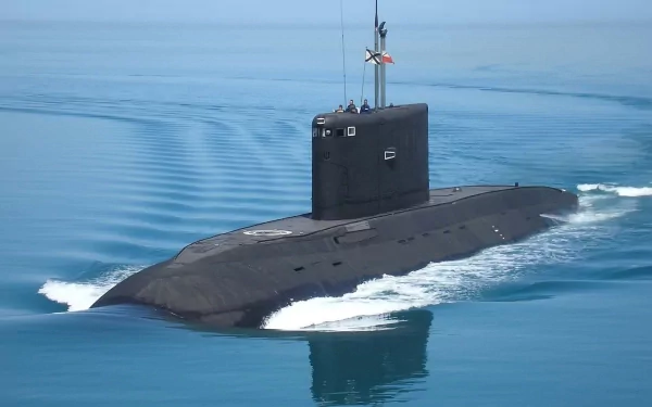 HD desktop wallpaper showing a military submarine cruising on calm blue waters, capturing naval strength and stealth in a high-definition background image.