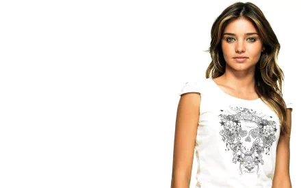 HD desktop wallpaper featuring celebrity Miranda Kerr in a casual white t-shirt with a floral design, set against a clean, bright background.