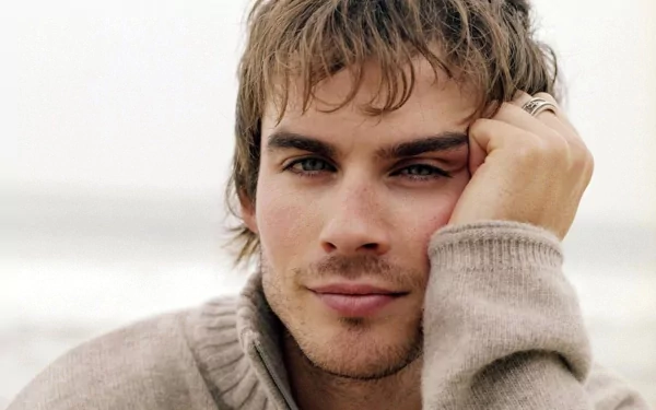 HD desktop wallpaper featuring celebrity Ian Somerhalder, with a relaxed and thoughtful expression, wearing a cozy sweater.