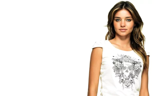 HD desktop wallpaper featuring celebrity Miranda Kerr in a casual white t-shirt with a floral design, set against a clean, bright background.