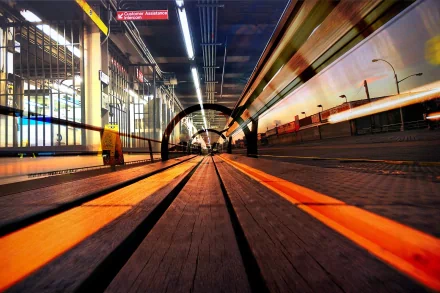 HD desktop wallpaper showcasing the man-made Coney Island subway platform with dynamic lighting and motion blur effects, emphasizing urban transit design.
