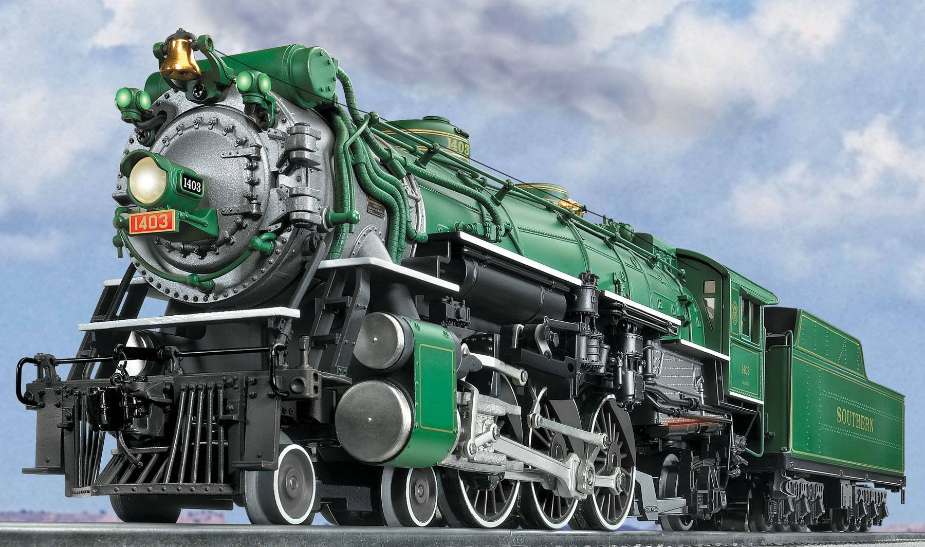 A vibrant green steam locomotive, detailed and powerful, captured in motion against a cloudy sky, serves as a striking HD desktop wallpaper and background.