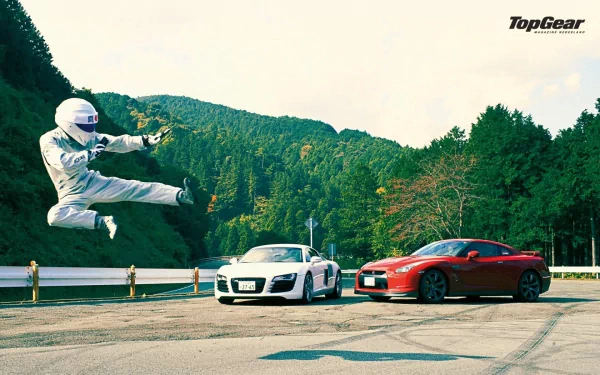 HD wallpaper of The Stig from Top Gear mid-jump between two sports cars, with a forest backdrop.