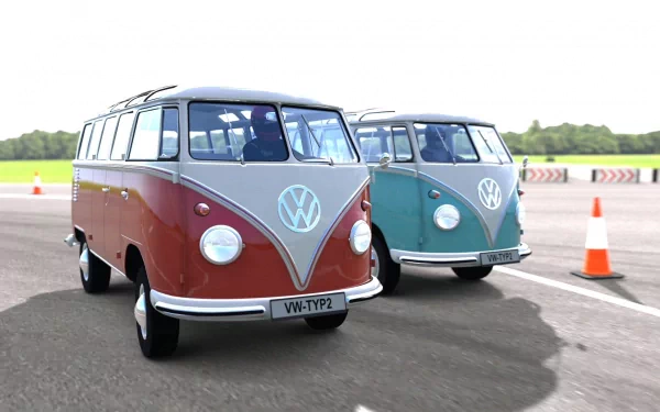 HD desktop wallpaper of two vintage Volkswagen buses from Gran Turismo 5 on a racetrack with cones.