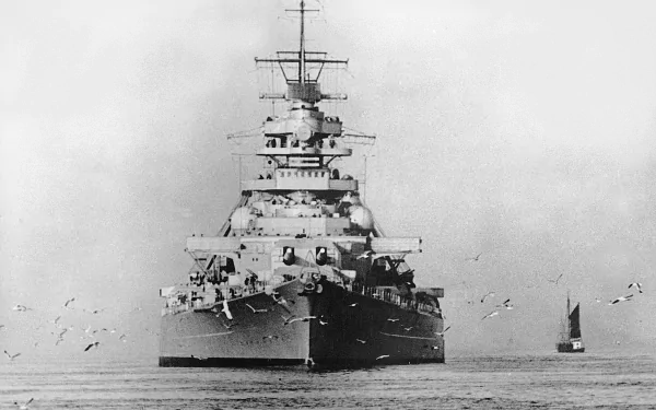 A striking HD wallpaper of the German battleship Bismarck, showcasing its formidable presence as it sails through calm waters, surrounded by seagulls.