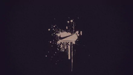 HD PC desktop wallpaper featuring a man-made artistic design of the Nike logo with paint splatter effects on a dark background.