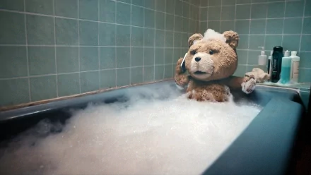 A scene featuring Ted, the movie character, relaxing in a bubbly bath while talking on the phone, making for a humorous and captivating HD PC desktop wallpaper.