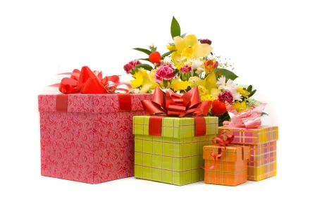 HD PC desktop wallpaper featuring a collection of colorful gift boxes with bows and a vibrant bouquet of flowers on a white background.