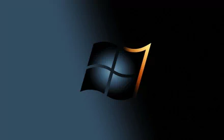 A sleek HD desktop wallpaper featuring the Windows 7 logo illuminated against a dark background, showcasing modern technology aesthetics.