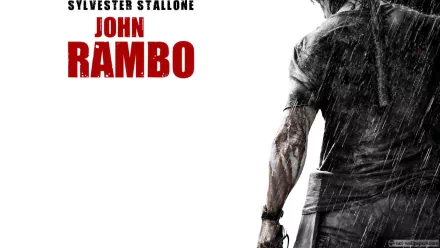 HD desktop wallpaper featuring the iconic character John Rambo, portrayed by Sylvester Stallone, with the name Rambo prominently displayed in bold red letters.