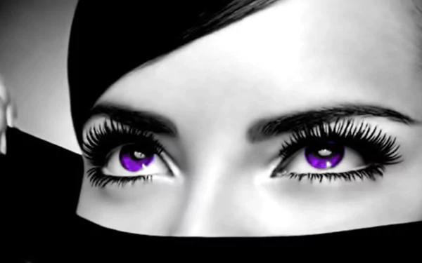 A striking close-up of a woman's eyes, featuring long lashes and vibrant purple irises, set against a monochrome background, creating an eye-catching HD desktop wallpaper.