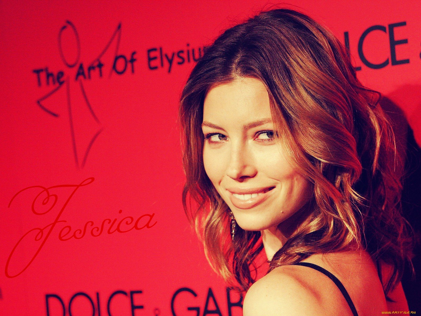 HD PC desktop wallpaper featuring a close-up of celebrity Jessica Biel smiling against a red background with artistic text.