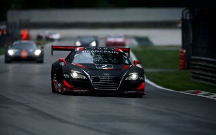 HD PC desktop wallpaper featuring an Audi race car competing in the Blancpain Endurance Series on a racetrack.