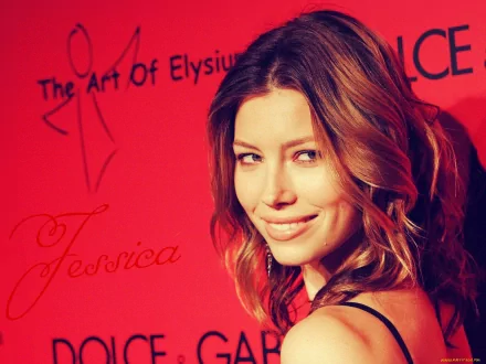 HD PC desktop wallpaper featuring a close-up of celebrity Jessica Biel smiling against a red background with artistic text.