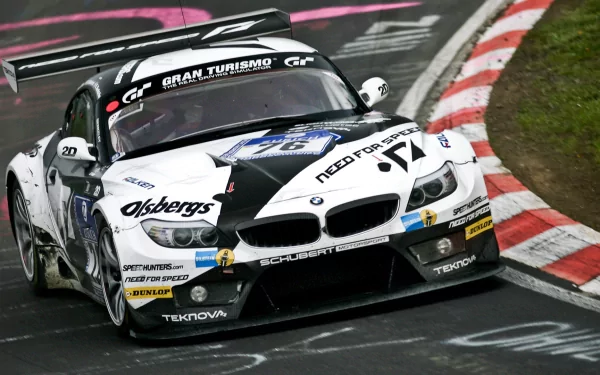 HD PC desktop wallpaper featuring a BMW Z4 GT3 racing on a track, showcasing its sleek design and performance as a high-speed vehicle in motorsport.