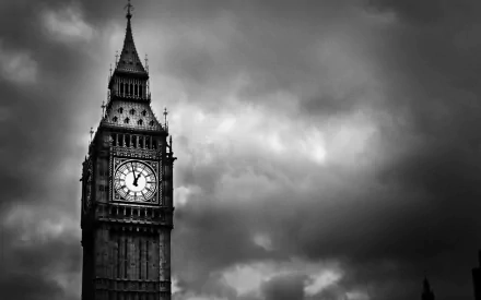 A dramatic black and white image of Big Ben in London, showcasing its iconic clock tower against a moody sky. This HD wallpaper captures the essence of the city's architecture.