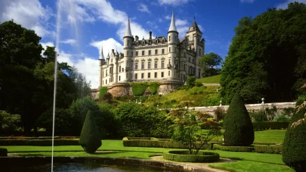 Man-made Dunrobin Castle HD PC desktop wallpaper/background: grand Scottish castle on terraced gardens with fountain under a bright blue sky