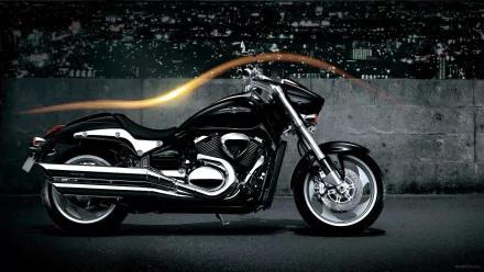 HD desktop wallpaper featuring a sleek black Suzuki Boulevard M90 motorcycle against an urban night backdrop with light trails.