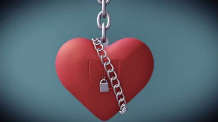 HD PC desktop wallpaper featuring a red heart locked with a silver chain and padlock, symbolizing Valentine's Day and themes of love and protection.