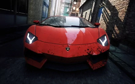 A striking HD wallpaper featuring a sleek red Lamborghini from Need For Speed: Most Wanted, set against an urban backdrop, showcasing the thrill of street racing.