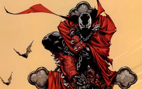 A dynamic HD wallpaper featuring Spawn, the iconic comic character, dressed in a flowing red cape and chains, set against a warm background with bats in flight.