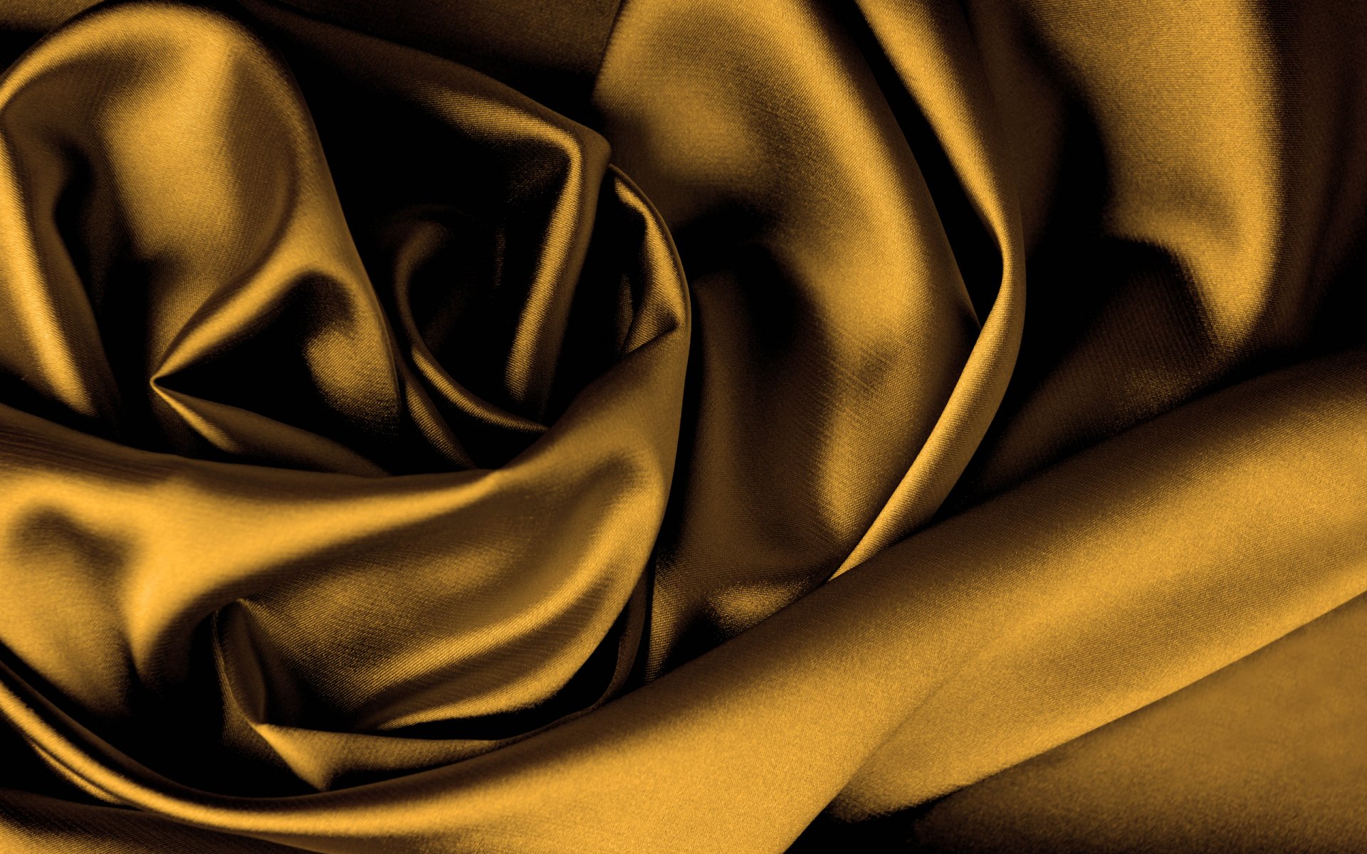 Abstract textured folds of smooth golden fabric create a luxurious and dynamic HD PC desktop wallpaper and background.