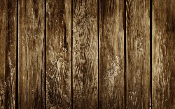 Artistic HD wallpaper featuring a close-up of rustic wooden planks, showcasing rich textures and warm tones that enhance any desktop background.