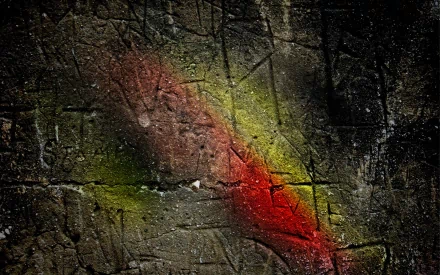 Abstract grunge texture featuring a gradient of red and green tones set against a dark, weathered background, making a striking HD wallpaper for PC desktops.