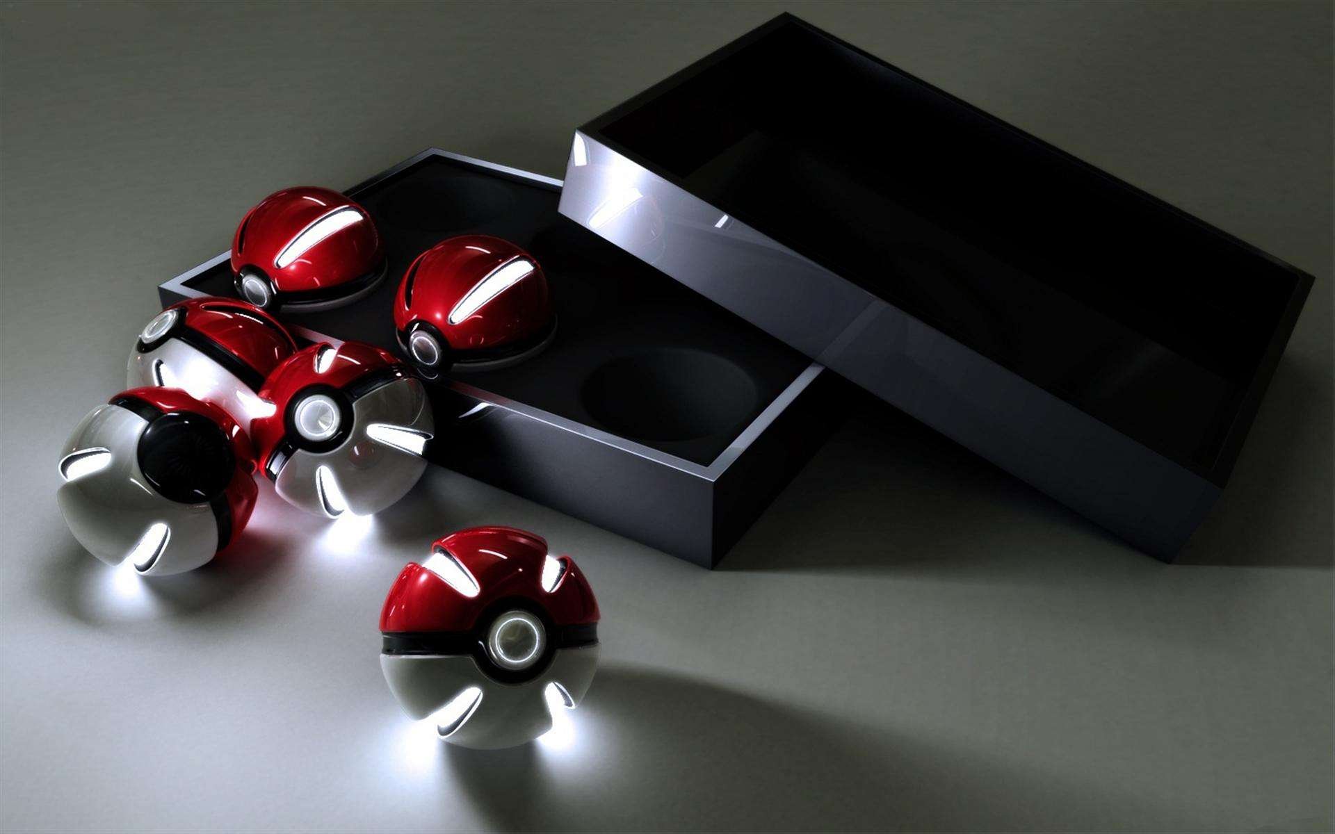 A collection of glowing Pokéballs rests beside a sleek black box, capturing the essence of the Pokémon anime in this striking HD desktop wallpaper.