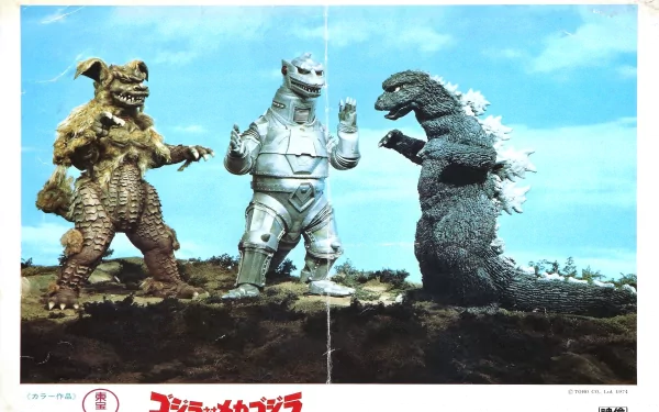 HD PC desktop wallpaper featuring iconic movie monsters Godzilla, Mechagodzilla, and another creature facing off in a dramatic scene from Godzilla vs. Mechagodzilla.