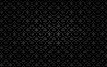 HD PC desktop wallpaper: dark ornamental damask pattern, an abstract repeating motif in subtle black and charcoal tones.