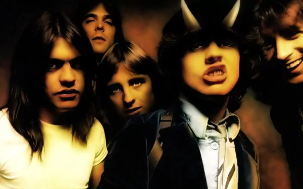 A vibrant HD wallpaper featuring Angus Young and the band AC/DC, capturing their dynamic presence and iconic energy in a striking background.
