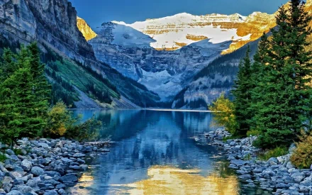 Lake Louise, Banff National Park, Alberta, Canada — turquoise lake reflecting snow‑capped mountains and evergreen trees; HD PC desktop wallpaper/background.