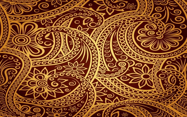 Abstract ornamental gold paisley and floral swirls on deep maroon — 2K Quad HD PC desktop wallpaper/background.