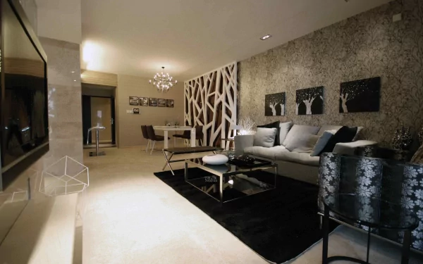 4K Ultra HD wallpaper depicting a modern living room with a stylish table, lounge seating, textured walls, and ambient lighting, showcasing sophisticated man-made design elements.