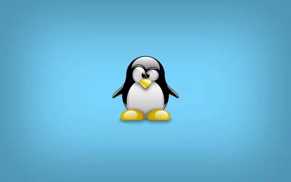 HD desktop wallpaper featuring Tux, the Linux penguin mascot, centered on a smooth blue background, representing technology and open-source software.