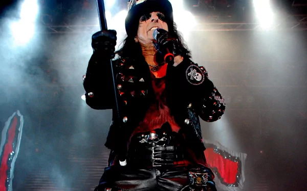 HD PC desktop wallpaper featuring rock musician Alice Cooper performing on stage with dramatic lighting and fog effects.