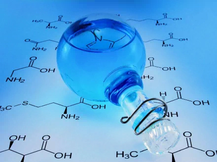A blue chemistry bottle glistens against a backdrop of chemical structures, embodying the essence of physics and chemistry in this HD desktop wallpaper.