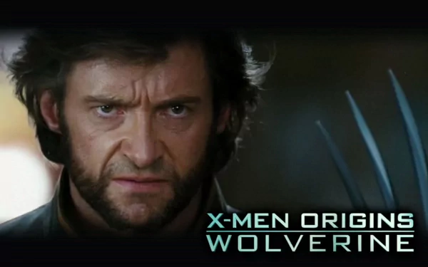 HD wallpaper of Hugh Jackman as Logan James Howlett/Wolverine from the movie X-Men Origins: Wolverine, featuring an intense expression with claw blades visible.