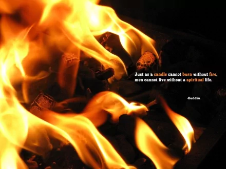 A captivating HD wallpaper featuring flames with a quote from Buddha: Just as a candle cannot burn without fire, men cannot live without a spiritual life. Insightful and spiritual.