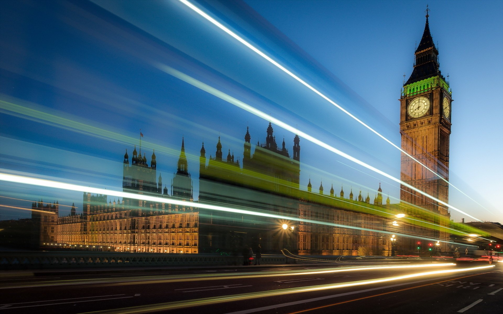HD desktop wallpaper of London's iconic Big Ben and the Palace of Westminster with dynamic light trails under a clear evening sky.