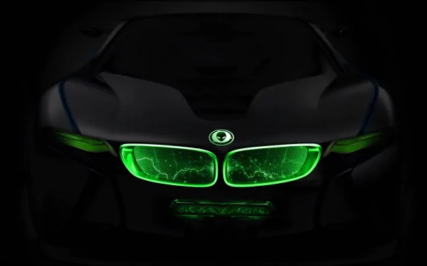 A striking HD desktop wallpaper featuring a sleek black car with vibrant green lights, showcasing a fusion of technology and modern design, tagged with Alienware.