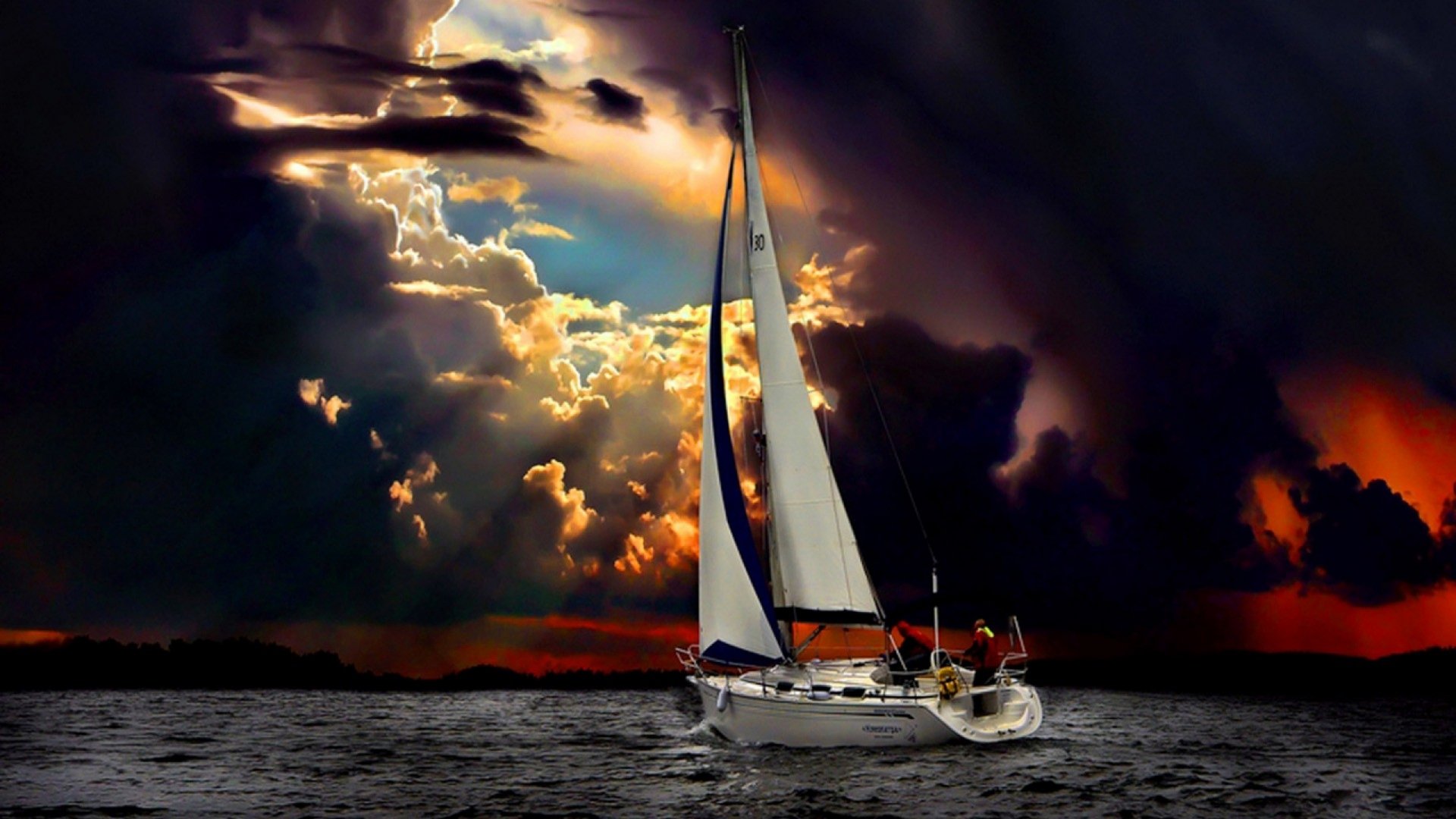 A sailboat glides across dark waters under a dramatic, cloud-filled sky, creating a striking HD desktop wallpaper featuring a vehicle on the sea.