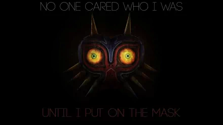 HD PC desktop wallpaper of Majora's Mask from The Legend of Zelda: Majora's Mask — the mask's glowing eyes on a black background with text No one cared who I was / Until I put on the mask.