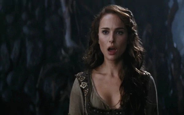 HD desktop wallpaper featuring Natalie Portman in character from the movie Your Highness, showcasing her in medieval attire with a dark, atmospheric background.