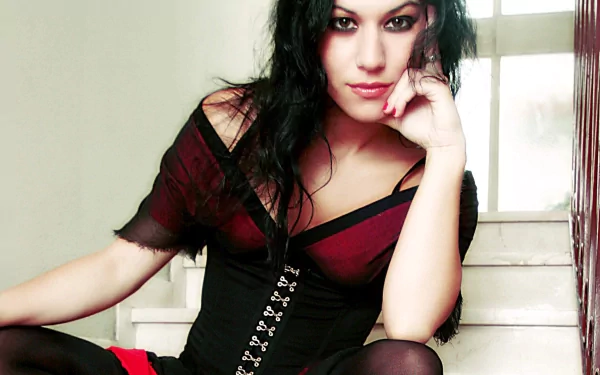 HD PC desktop wallpaper featuring a member of the band Lacuna Coil in gothic attire, reflecting the music group's dark and edgy style.