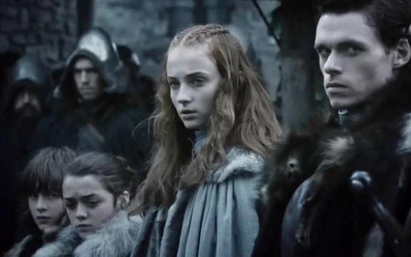 A gripping scene from *Game of Thrones*, featuring Richard Madden as Robb Stark, Maisie Williams as Arya Stark, and Sophie Turner as Sansa Stark, captured in a dramatic moment.