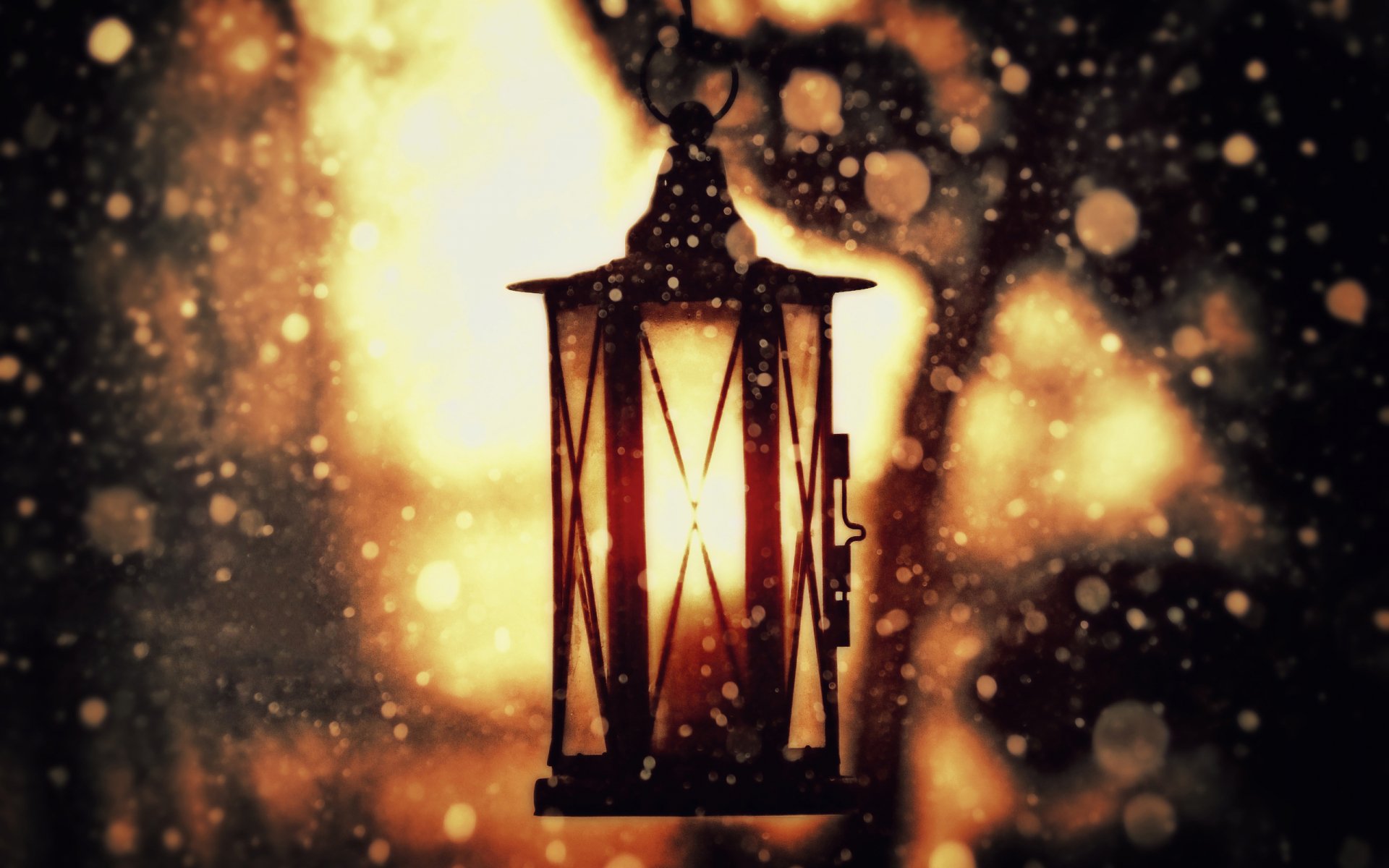 A beautifully crafted lantern illuminates the scene, surrounded by soft bokeh effects, creating a warm ambiance. This HD image serves as an inviting desktop wallpaper background.