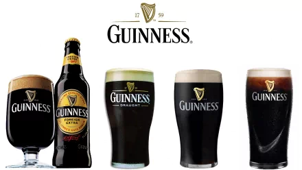 A collection of Guinness products, including a bottle and various glasses of the iconic dark beer, set against a clean background, showcasing the brand's legacy and craftsmanship.